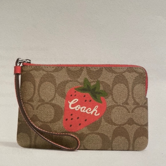 Coach Handbags - NWT Coach Corner Zip Wristlet In Signature Canvas With Wild Strawberry